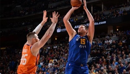  太阳加时险胜掘金登顶西部  